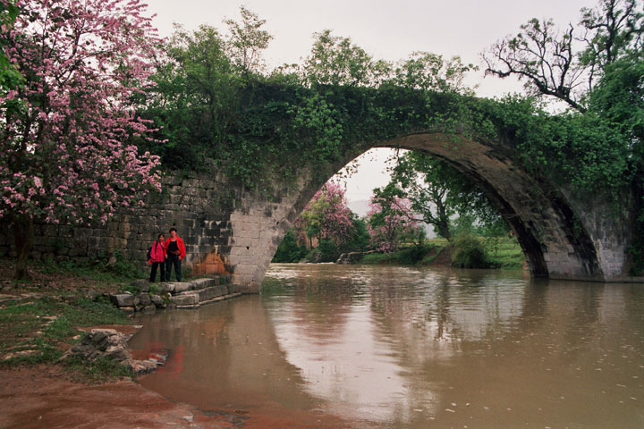 Mrs. Hanna Tabib and her guide at Yulong River in 1988