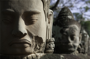 Stone warrior sculptures at the South Gate of Angkor Thom