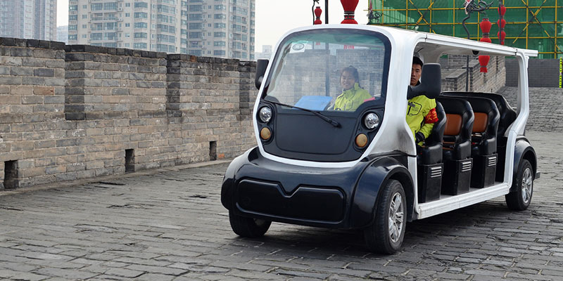 Take the eco-car running on the city wall