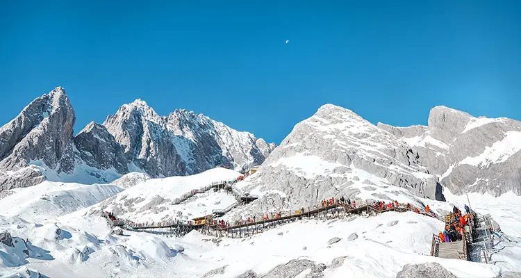 Take a cable car to the snow-capped zone of Jade Dragon Snow Mountain