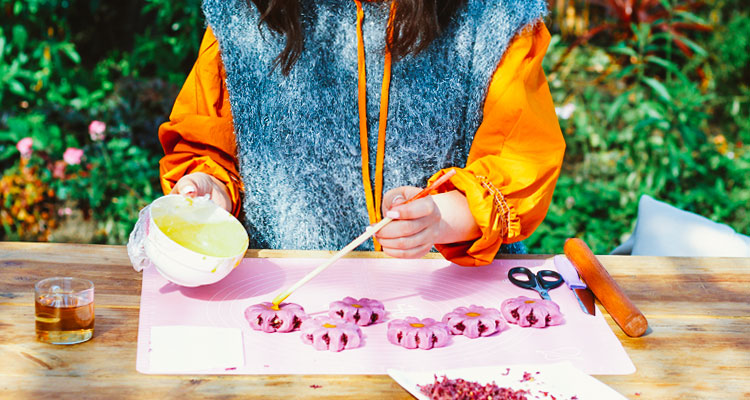 making delicious local cakes together