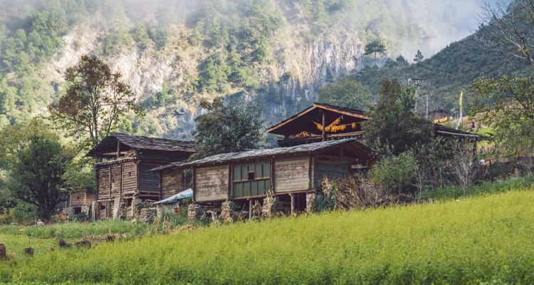 the peaceful village on the bank of the blue river